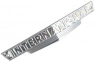 FRONT EMBLEM 
 INTERNATIONAL 
 NOT PAINTED 
 10-1/8" L X 1-11/16" H 
 USA MADE 
 International Applications: FARMALL A INDUSTRIAL & EXPORTED